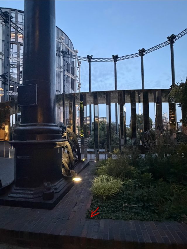 Hand-painted penguin stone #1221 hidden at Gasholder Park, London, United Kingdom (photo 3 of 5)