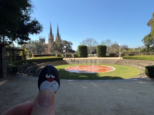 Hand-painted penguin stone #1283 hidden at Sandringham Memorial Gates, Sydney, Australia