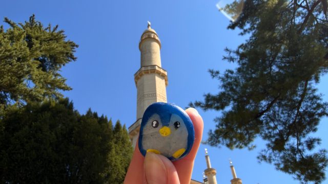 Hand-painted penguin stone #1383 hidden at Lednice Minaret, Lednice, Czechia