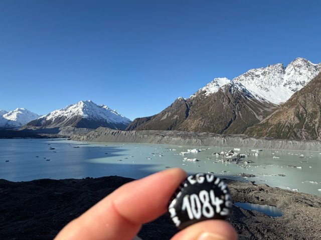 Hand-painted penguin stone #1084 hidden at Tasman Glacier View, Aoraki/Mount Cook National Park, New Zealand (photo 2 of 5)