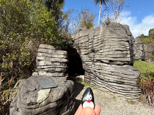 Hand-painted penguin stone #1287 hidden at Ruakuri Cave, Waitomo Region, New Zealand