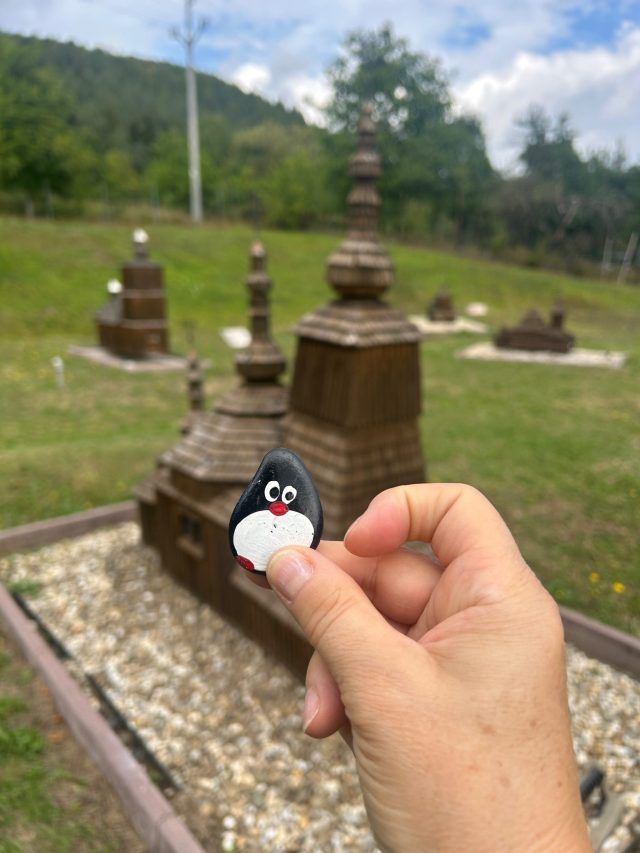 Hand-painted penguin stone #1304 hidden at Ladomirova Mini Wooden Church, Lutina, Slovakia (photo 3 of 3)
