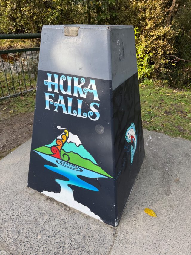 Hand-painted penguin stone #2320 hidden at Huka Falls, Taipo, New Zealand (photo 4 of 5)