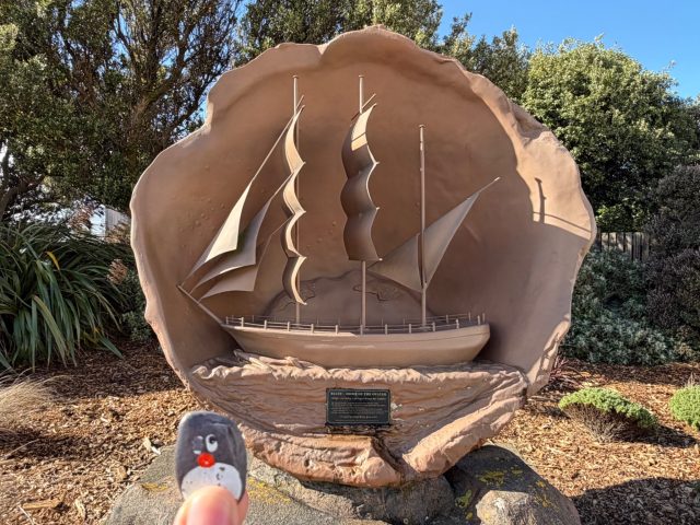 Hand-painted penguin stone #2335 hidden at Bluff info kiosk, Invercargill City, New Zealand