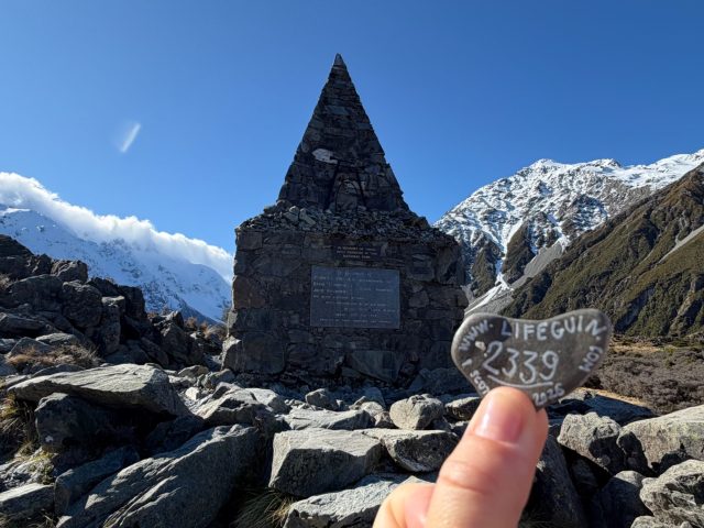Hand-painted penguin stone #2339 hidden at Alpine Memorial, Hooker Valley Track, New Zealand (photo 2 of 3)