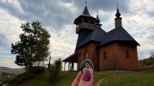 Hand-painted penguin stone #785 hidden at Church of the Holy Family, Lutina, Slovakia (photo 4 of 5)
