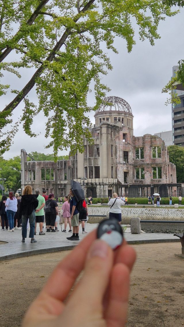 Hand-painted penguin stone #874 hidden at Tree Trunk, Hiroshima, Japan (photo 2 of 4)