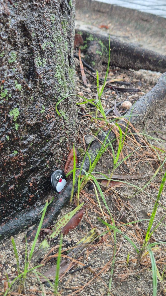 Hand-painted penguin stone #874 hidden at Tree Trunk, Hiroshima, Japan (photo 3 of 4)