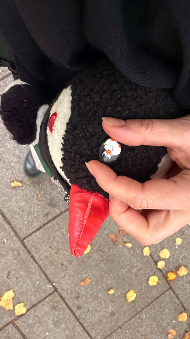 Hand-painted penguin stone #1089 hidden at Snail close to Railway Station, Oslo, Norway (photo 3 of 5)