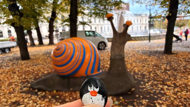Hand-painted penguin stone #1089 hidden at Snail close to Railway Station, Oslo, Norway