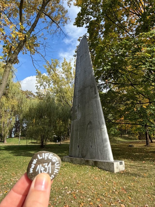 Hand-painted penguin stone #1431 hidden at Pomnik - Skrzydlo Li-2, Krakow, Poland (photo 2 of 4)