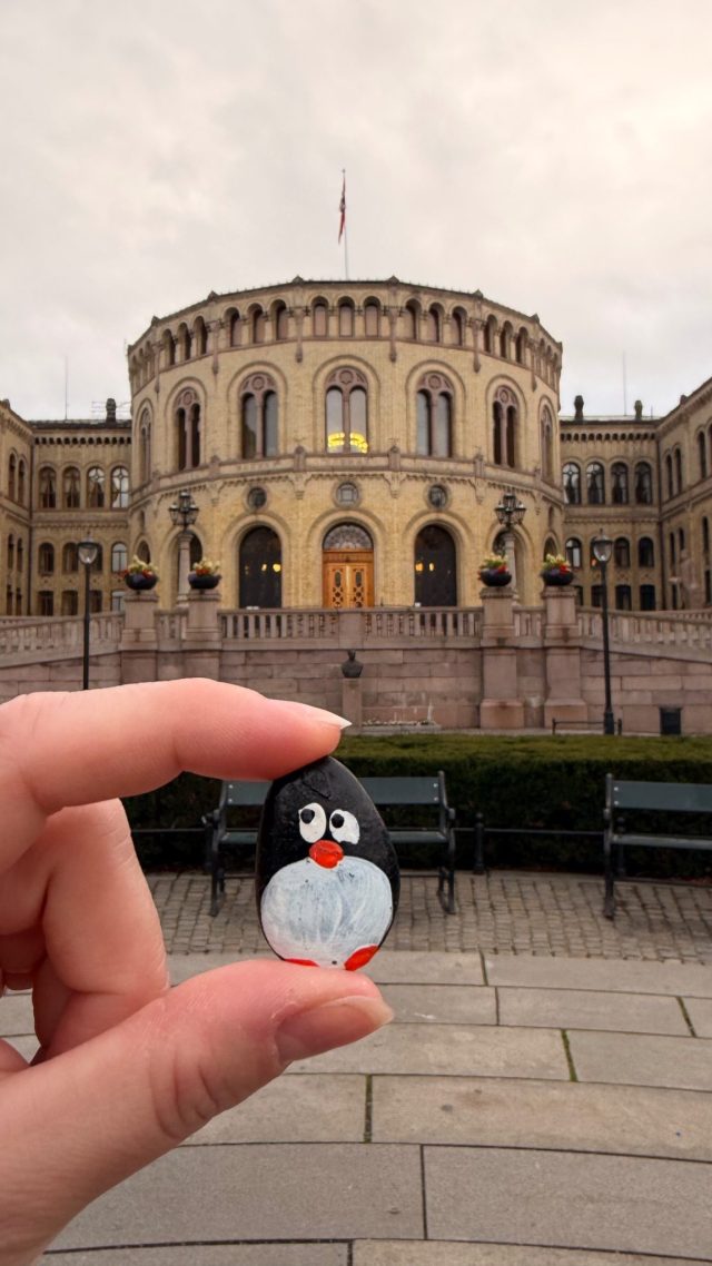 Hand-painted penguin stone #1471 hidden at The Norwegian Parliament, Oslo, Norway (photo 2 of 5)