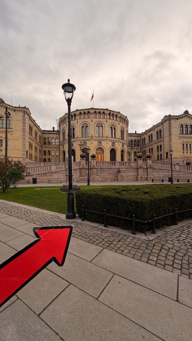 Hand-painted penguin stone #1471 hidden at The Norwegian Parliament, Oslo, Norway (photo 4 of 5)