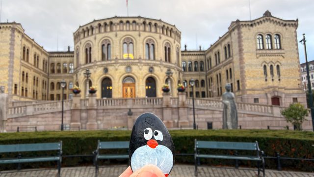 Hand-painted penguin stone #1471 hidden at The Norwegian Parliament, Oslo, Norway