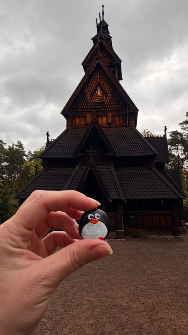 Hand-painted penguin stone #1493 hidden at The Stave Church from Gol, Oslo, Norway (photo 2 of 5)
