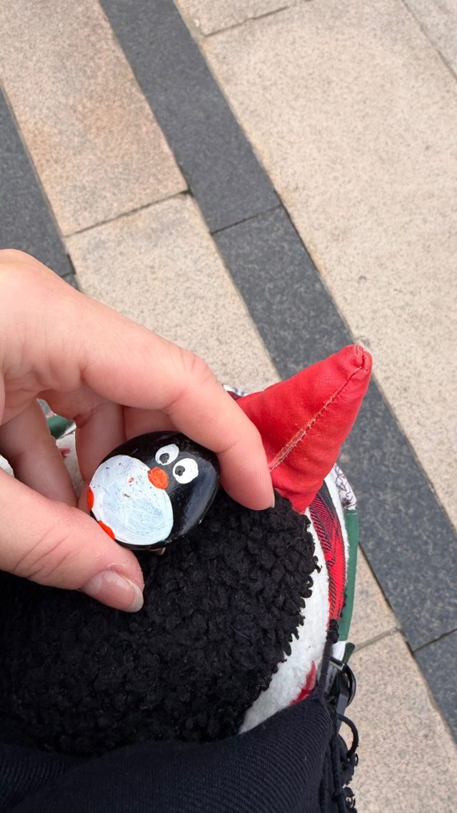 Hand-painted penguin stone #1494 hidden at Oslo City Hall Harbor, Oslo, Norway (photo 2 of 5)