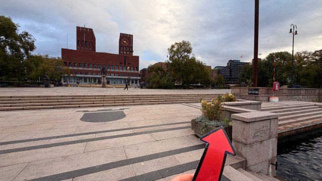 Hand-painted penguin stone #1494 hidden at Oslo City Hall Harbor, Oslo, Norway (photo 4 of 5)
