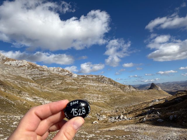 Hand-painted penguin stone #1528 hidden at Mountain Pass Sedlo, NP Durmitor, Montenegro (photo 2 of 5)