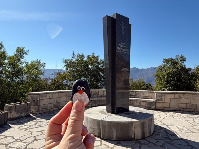Hand-painted penguin stone #1529 hidden at Gedenkstein, Povija, Montenegro (photo 2 of 5)