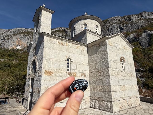 Hand-painted penguin stone #1537 hidden at The Church of the Holy Martyr Stanko, Ostrog, Montenegro (photo 2 of 4)