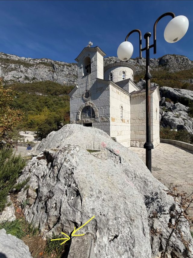 Hand-painted penguin stone #1537 hidden at The Church of the Holy Martyr Stanko, Ostrog, Montenegro (photo 4 of 4)