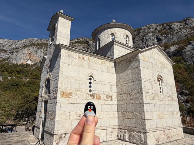 Hand-painted penguin stone #1537 hidden at The Church of the Holy Martyr Stanko, Ostrog, Montenegro