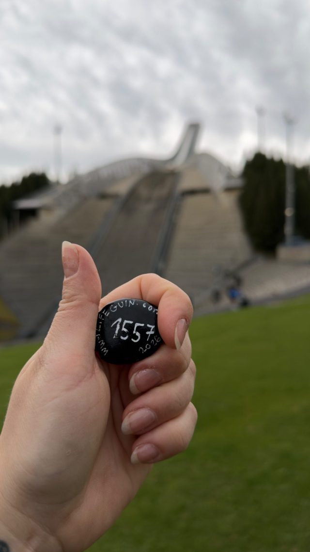 Hand-painted penguin stone #1557 hidden at Holmenkollbakken, Oslo, Norway (photo 3 of 5)