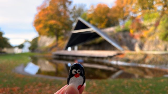 Hand-painted penguin stone #1560 hidden at Akershus Fortress Stage, Oslo, Norway