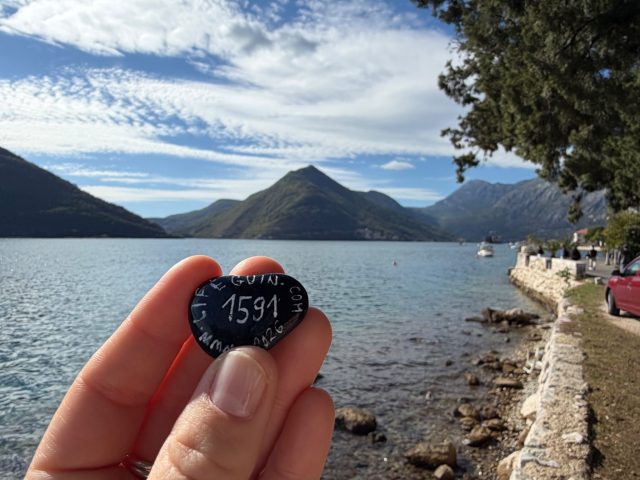 Hand-painted penguin stone #1591 hidden at Perast Beach, Perast, Montenegro (photo 2 of 5)