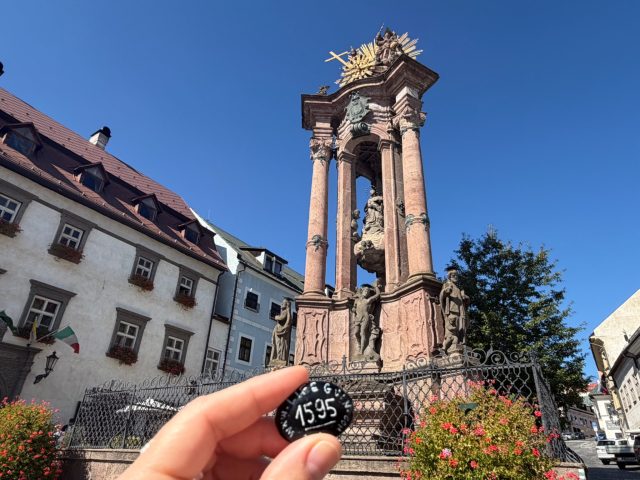 Hand-painted penguin stone #1595 hidden at Namestie sv.Trojice, Banska Stiavnica, Slovakia (photo 2 of 5)