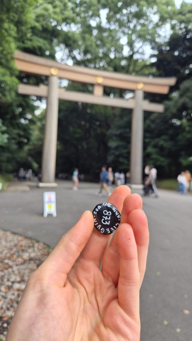 Hand-painted penguin stone #873 hidden at Meiji Jingu Ichino Torii, Tokyo, Japan (photo 2 of 5)