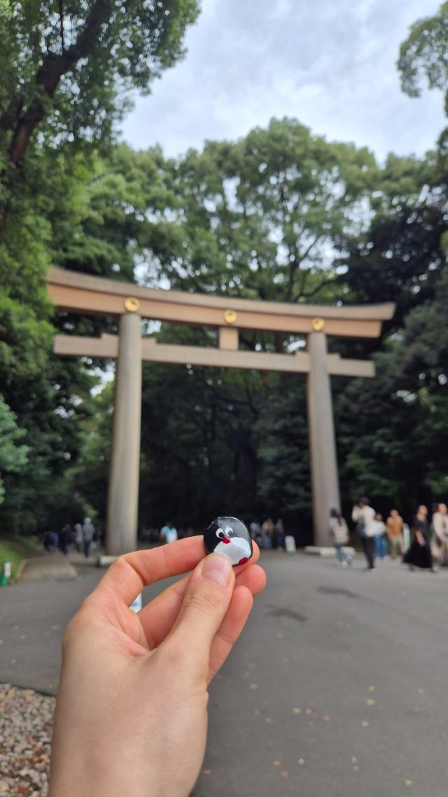 Hand-painted penguin stone #873 hidden at Meiji Jingu Ichino Torii, Tokyo, Japan