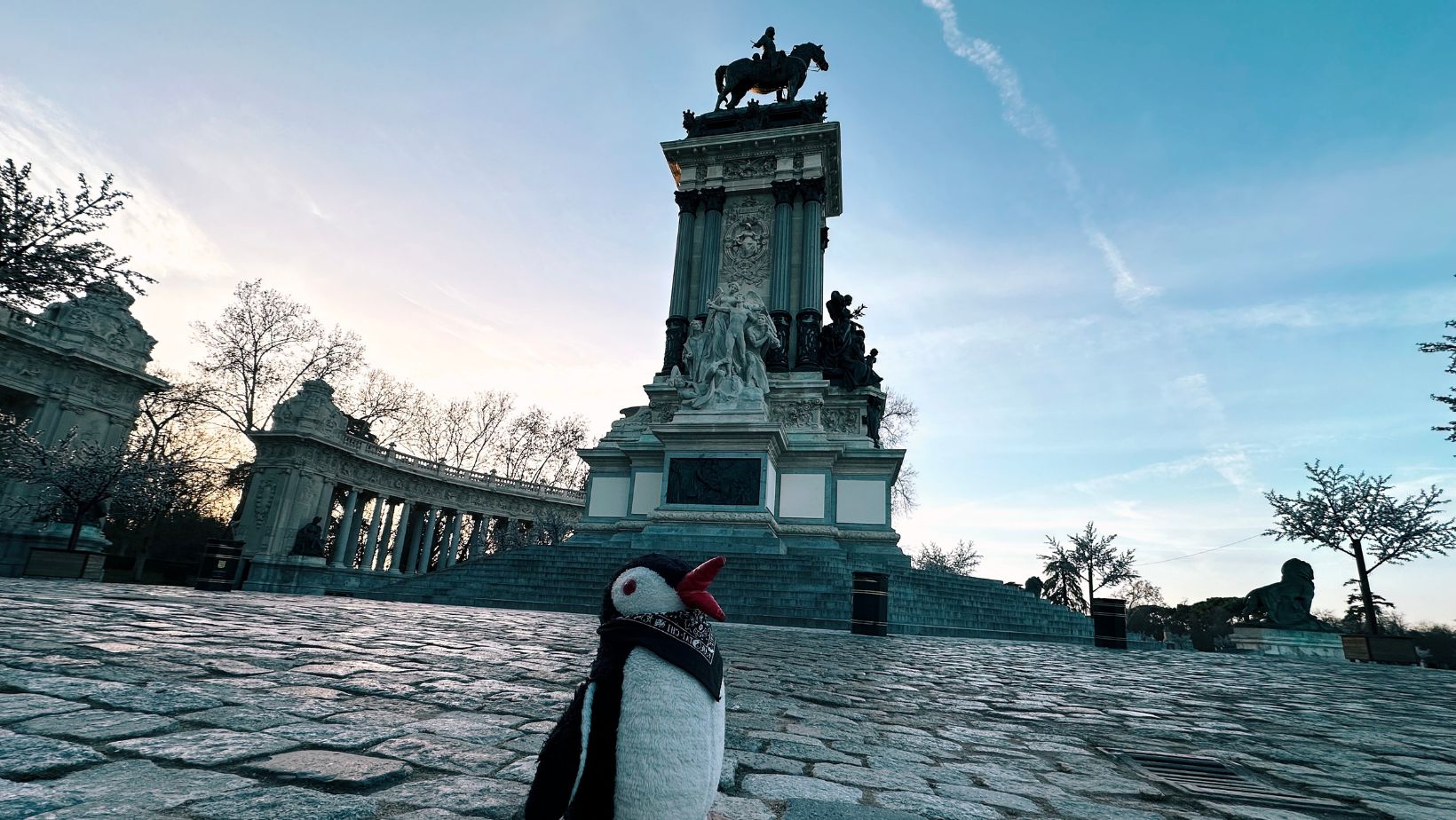 Hand-painted penguin stone #72 hidden at Monument to Alfonso XII, Madrid, Spain (photo 1 of 5)
