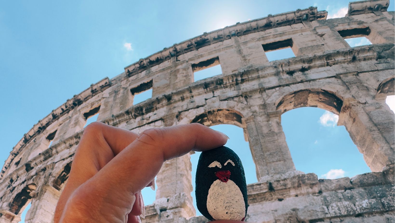 Hand-painted penguin stone #141 hidden at Pula Citadel, Pula, Croatia (photo 1 of 5)