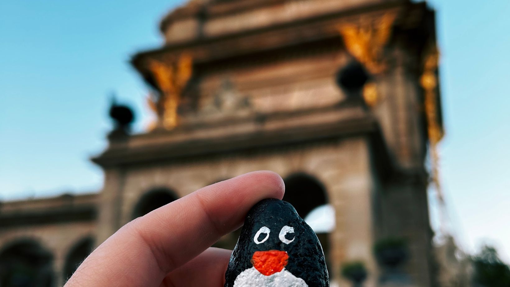 Hand-painted penguin stone #250 hidden at Ciutadella Park, Barcelona, Spain (photo 1 of 5)