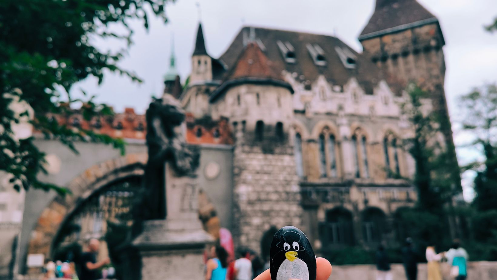 Hand-painted penguin stone #77 hidden at Vajdahunyad Castle, Budapest, Hungary (photo 1 of 5)