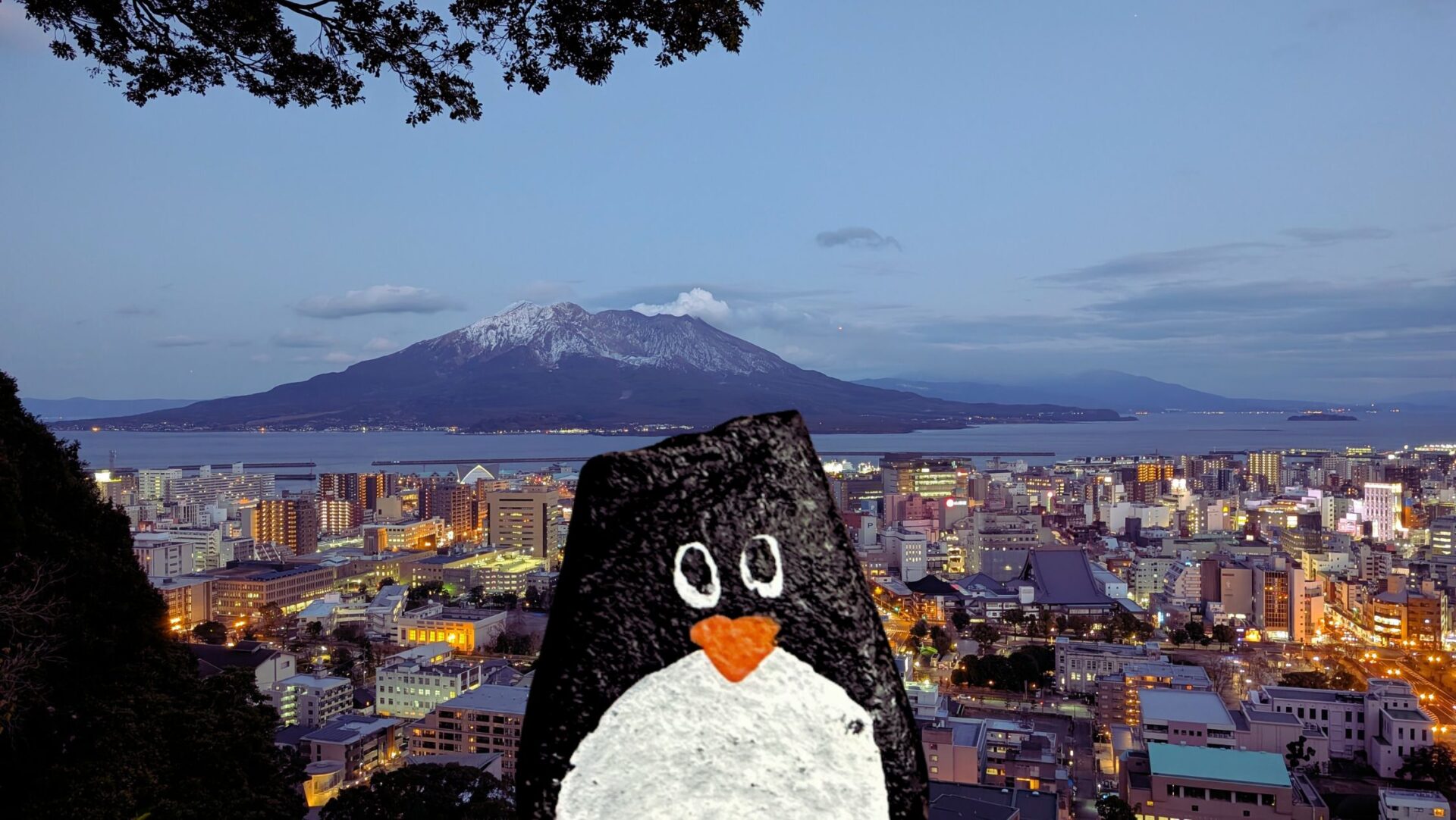 Hand-painted penguin stone #294 hidden at Shiroyama Park Observation Deck, Kagoshima, Japan (photo 1 of 4)