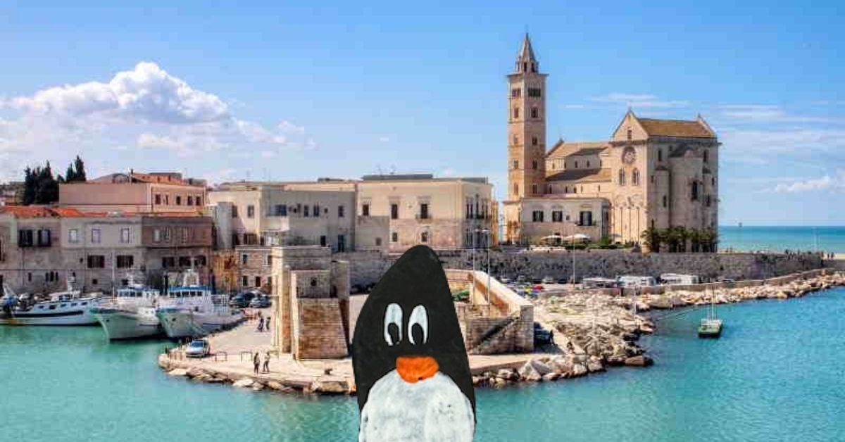 Hand-painted penguin stone #357 hidden at Parco Giochi, Trani, Italy (photo 1 of 5)