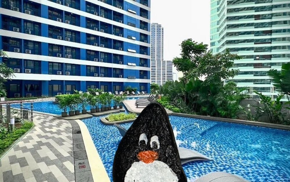 Hand-painted penguin stone #236 hidden at Air Residences, Makati, Philippines (photo 1 of 5)