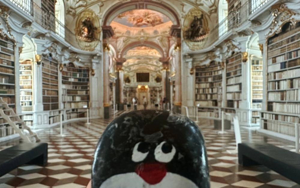Hand-painted penguin stone #443 hidden at Admont Abbey, Admont, Austria (photo 1 of 5)