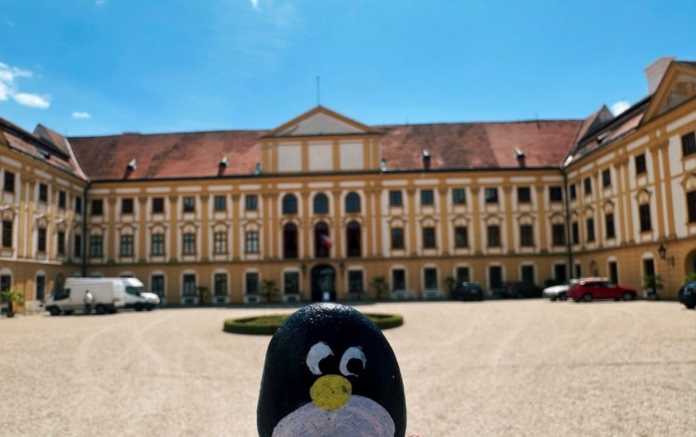 Hand-painted penguin stone #587 hidden at Church Tower, Jaromerice nad Rokytnou, Czechia (photo 1 of 5)