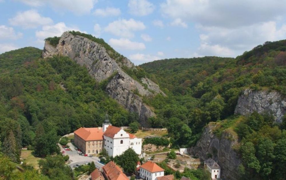 Hand-painted penguin stone #284 hidden at St. John's Rock Wall, Svaty Jan pod Skalou, Czechia (photo 1 of 5)