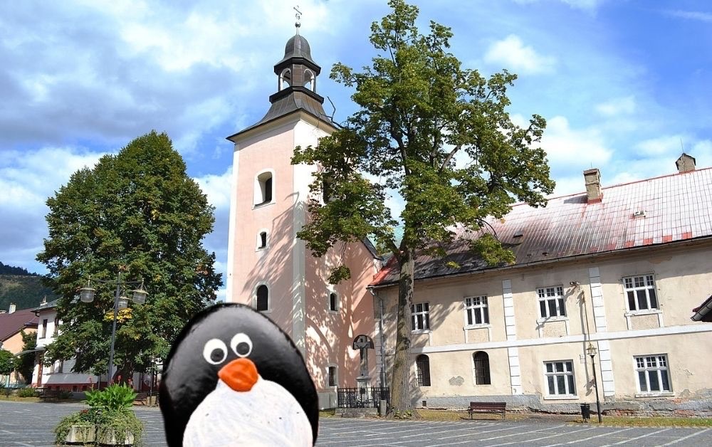 Hand-painted penguin stone #622 hidden at The Church of St. Elizabeth the Widow, Kremnica, Slovakia (photo 1 of 5)