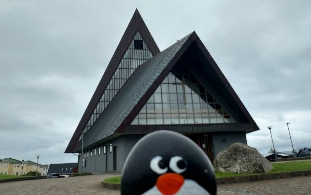 Hand-painted penguin stone #636 hidden at Vesturkirkjan, Torshavn, Faroe Islands (photo 1 of 5)
