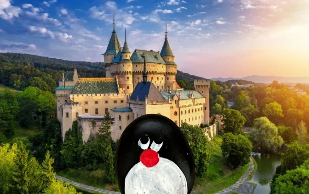 Hand-painted penguin stone #718 hidden at Bojnice Castle, Bojnice, Slovakia (photo 1 of 5)