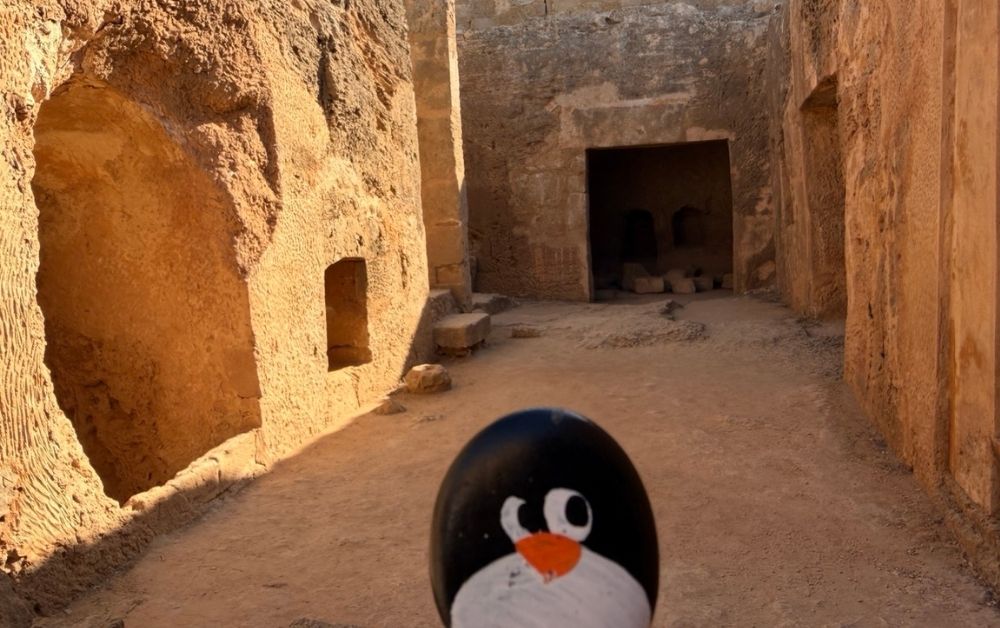 Hand-painted penguin stone #753 hidden at Tomb 7 at Tombs of Kings, Paphos, Cyprus (photo 1 of 5)