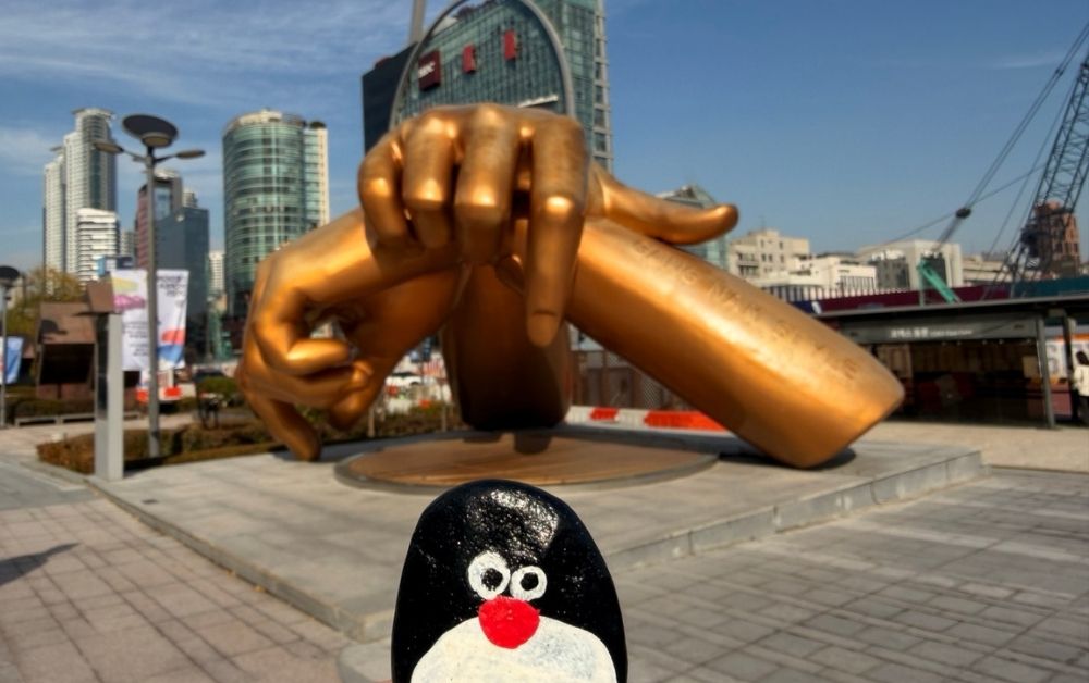 Hand-painted penguin stone #720 hidden at Gangnam Style Sculpture, Seoul, South Korea (photo 1 of 5)