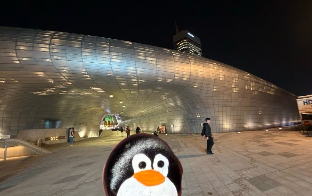 Hand-painted penguin stone #729 hidden at DDP, Seoul, South Korea (photo 1 of 5)