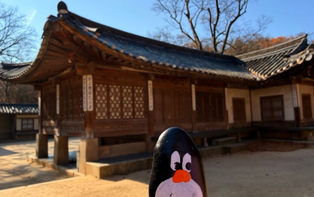 Hand-painted penguin stone #779 hidden at Door at Secret Garden, Seoul, South Korea (photo 1 of 5)