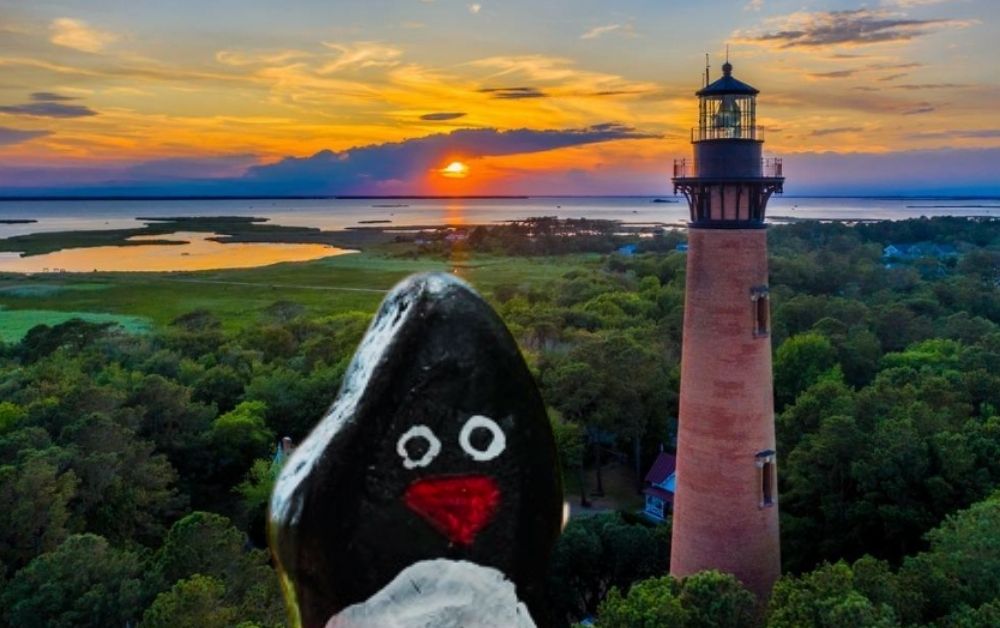 Hand-painted penguin stone #303 hidden at Currituck Beach Lighthouse, North Carolina, United States (photo 1 of 5)